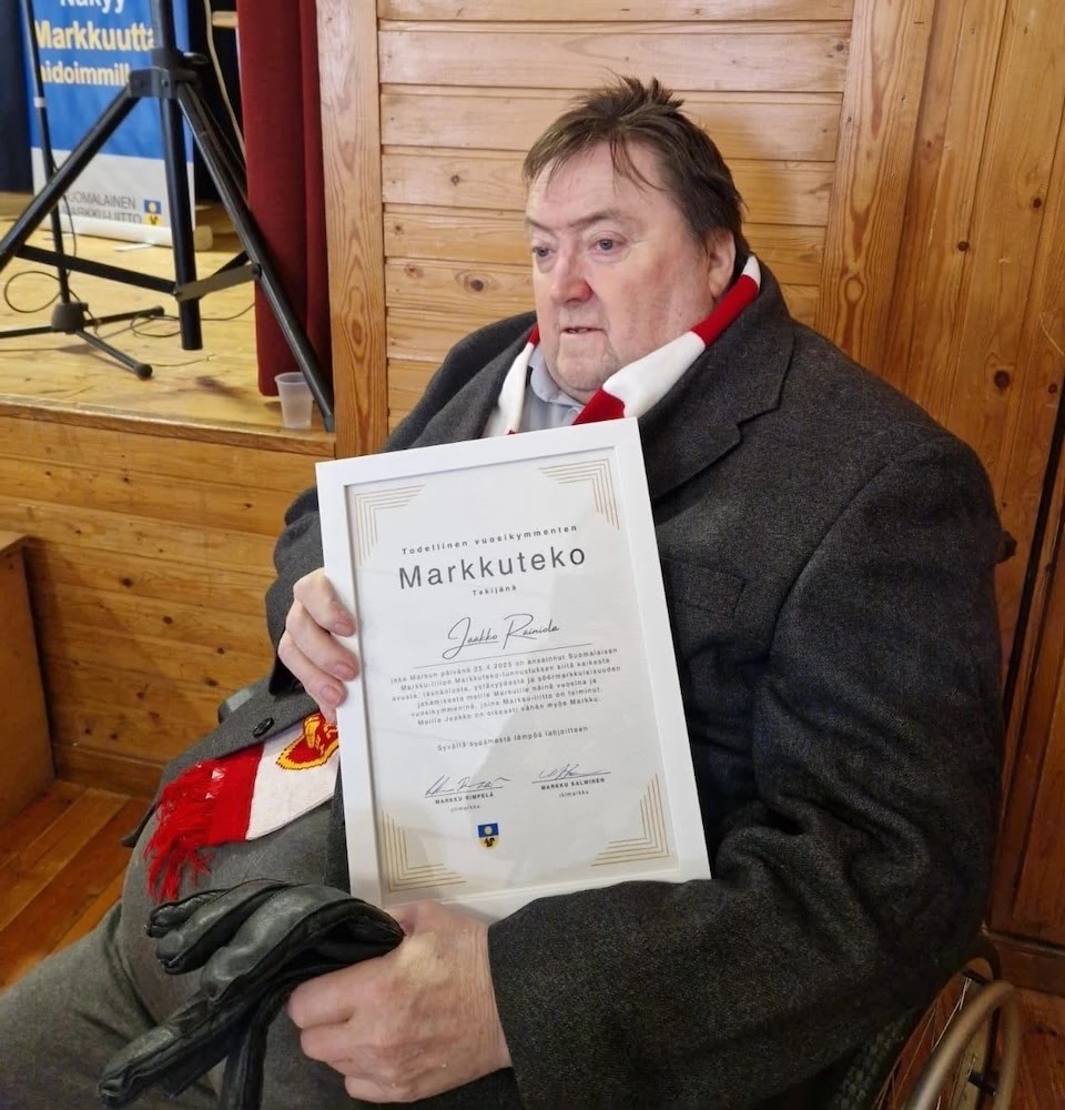 Jaakko Rainiola pääsi tänä vuonna paikalle pyörätuolilla. Jaakon saaman Markkuteko-diplomin tekstissä todetaan mm. että Jaakko on meille vähän myös Markku.